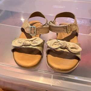 Worn. size 8 gold Stride Rite sandals